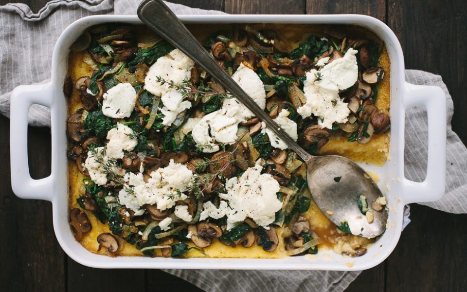 Ricotta Goat Cheese Polenta Bake with Mushrooms, Greens, and Caramelized Onions